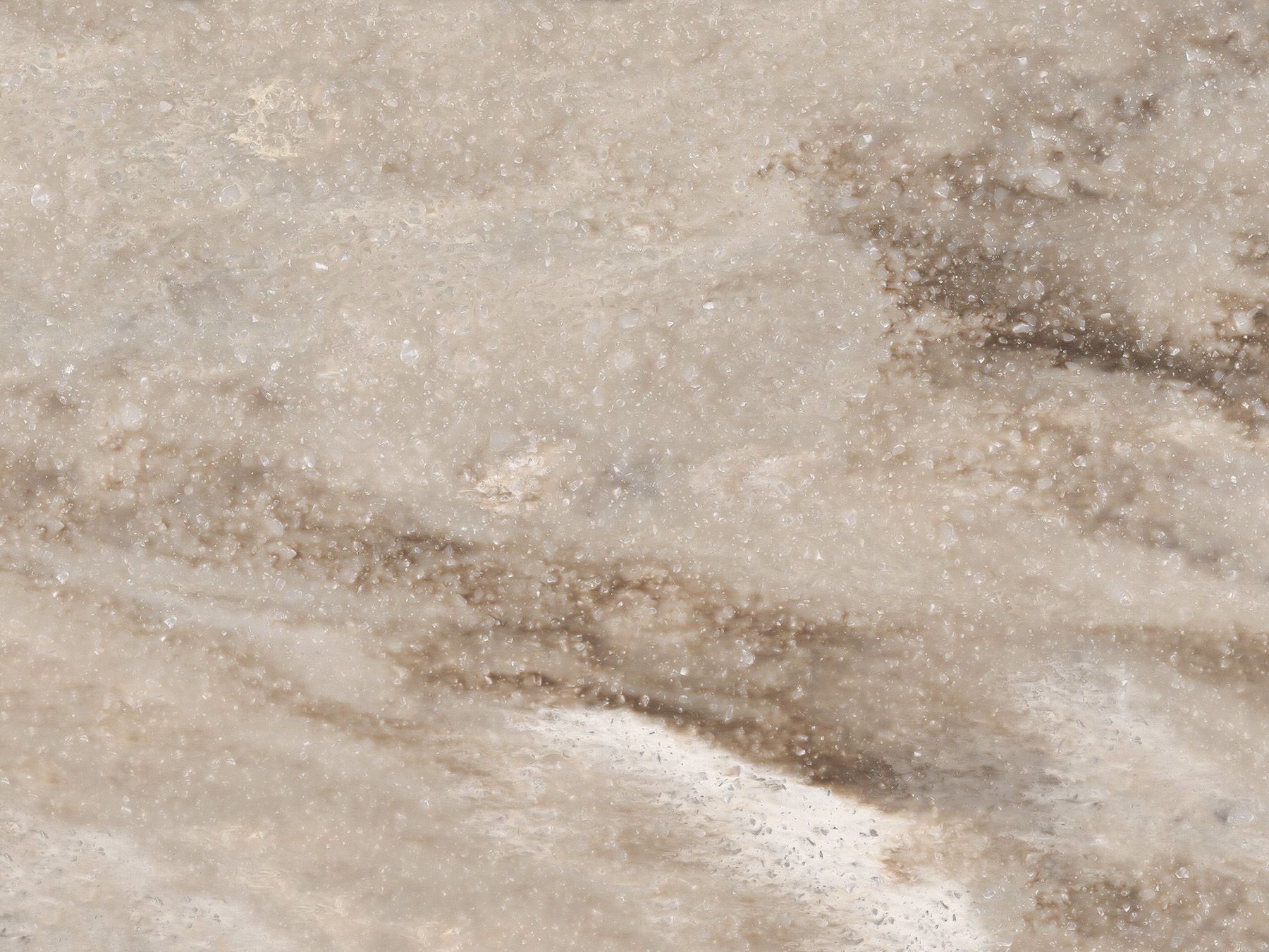 Beige and brown marbled stone texture.