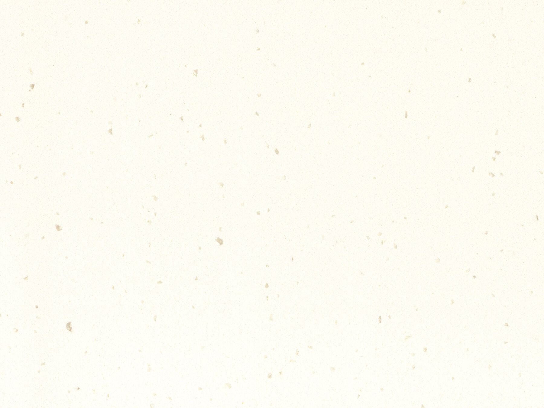 Off-white surface with tiny, scattered flecks of darker color.