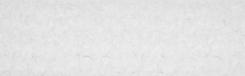 White, textured background with subtle variations in tone.