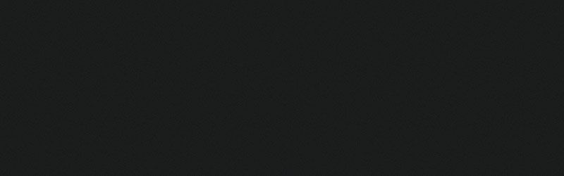 A dark, almost black, textured background.