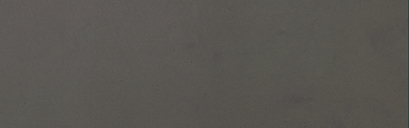 Gray surface with a subtle grid pattern.