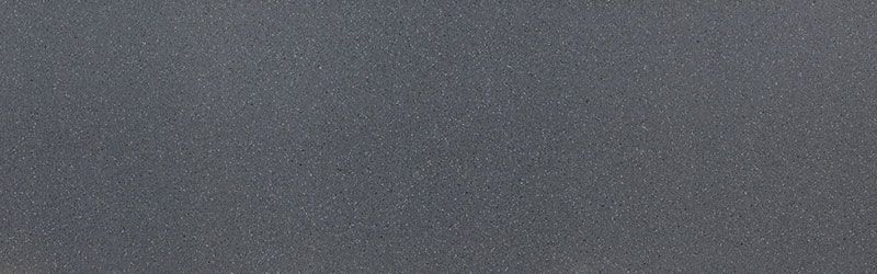 Dark gray speckled surface.