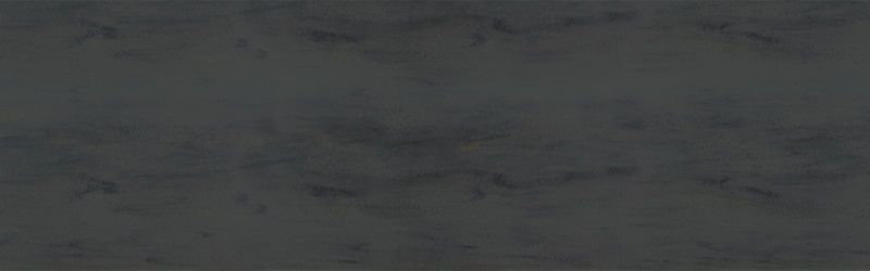 Dark gray, mottled surface with subtle texture.