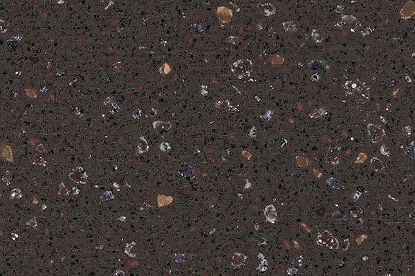 Dark brown quartz countertop with flecks of gold and white.