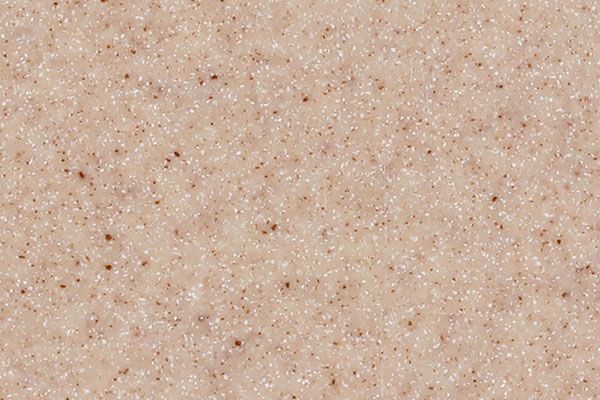Beige speckled surface.