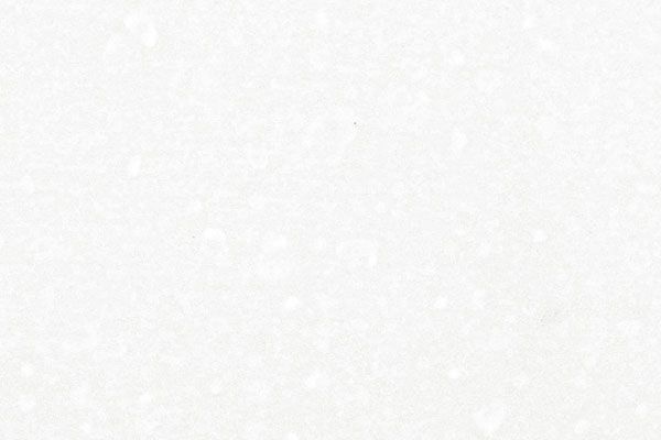 White speckled surface.