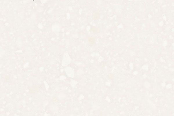 Cream-colored, speckled quartz countertop.