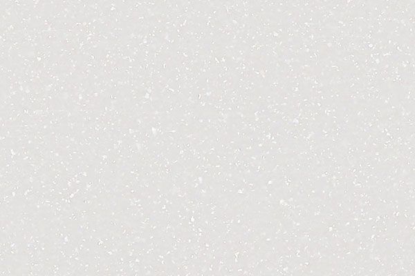 Off-white, textured surface with small, speckled details.