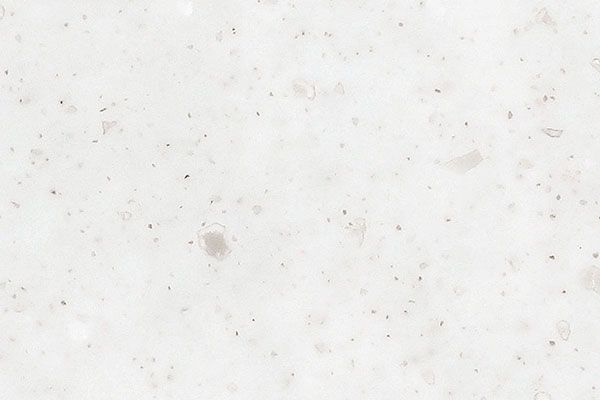 White countertop with light gray speckles and mottled pattern.