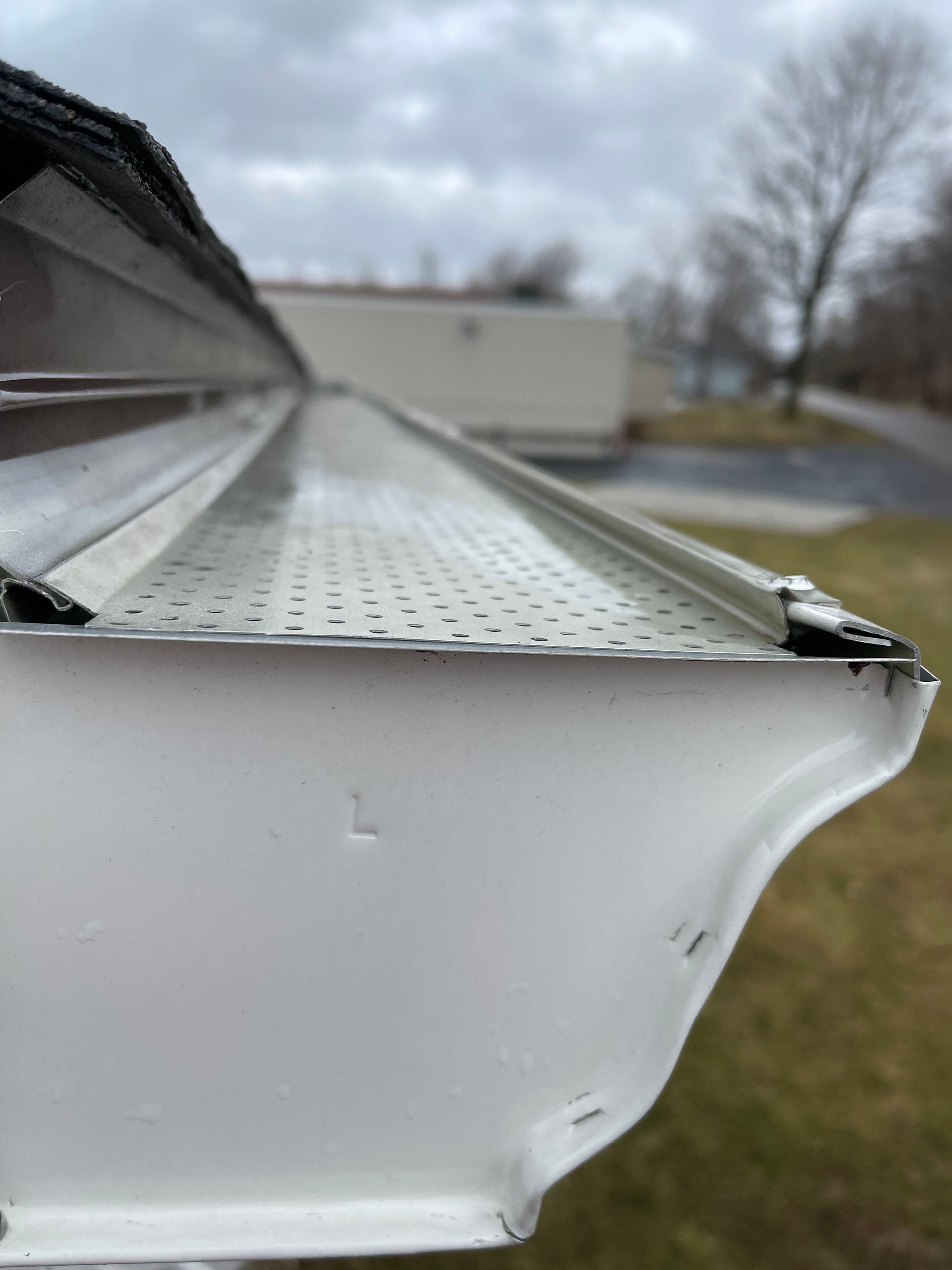 Hand Cleaning The Gutter — North East, PA — Bellingham Property Works