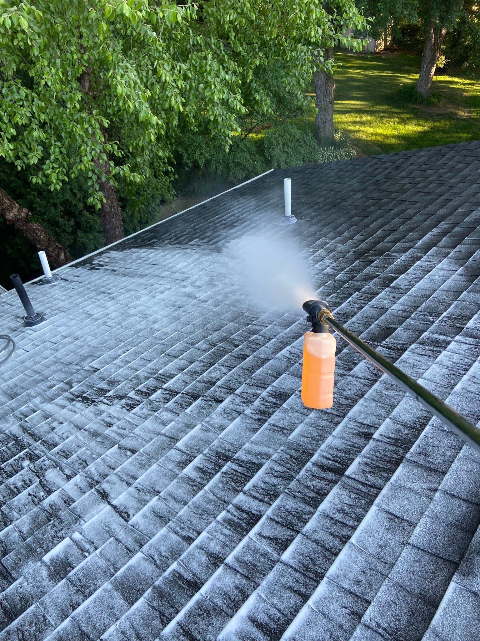 Man Cleaning The Roof — North East, PA — Bellingham Property Works