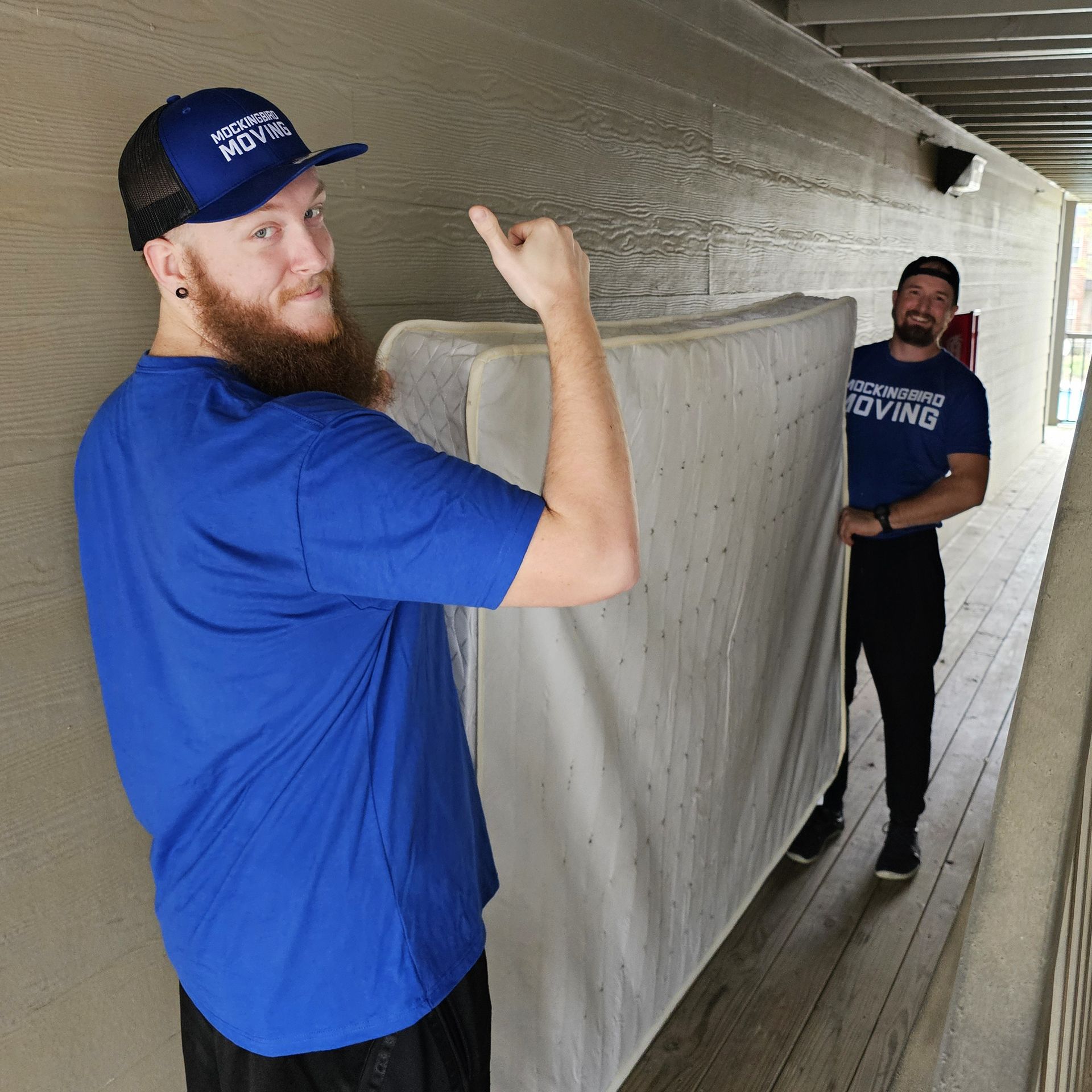 A Moving Truck Is Parked In Front Of A House - Fayetteville, AR - Mockingbird Moving