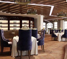 A large room with tables and chairs in it