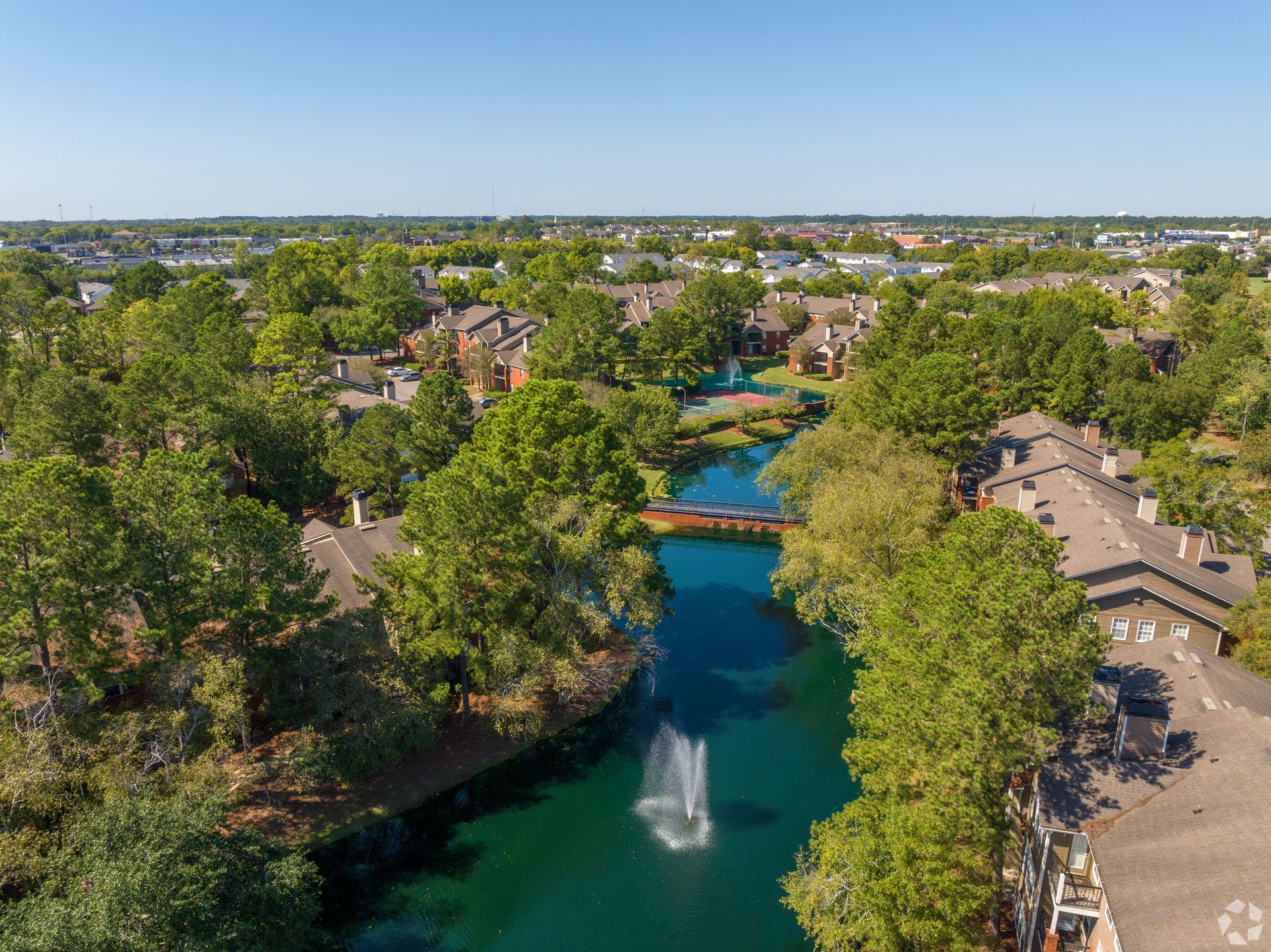 Photo of city skyline and river