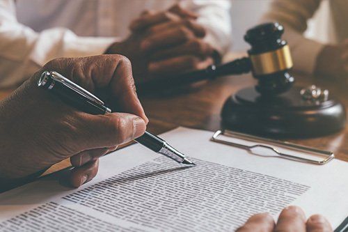 Lawyer with a Pen and Paper — Danville, KY — McClure, McClure & Bailey
