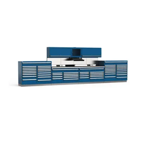 A long blue cabinet with drawers and a computer on top of it.