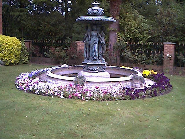 statue at the center of the garden