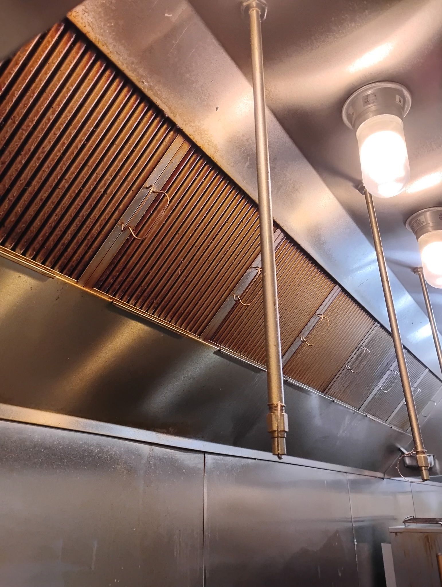 Before kitchen hood and exhaust fan cleaning