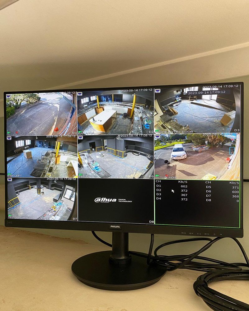 A Computer Monitor With a Lot of Pictures on It is Sitting on a Table — DGC Tech Solutions In Mareeba, QLD