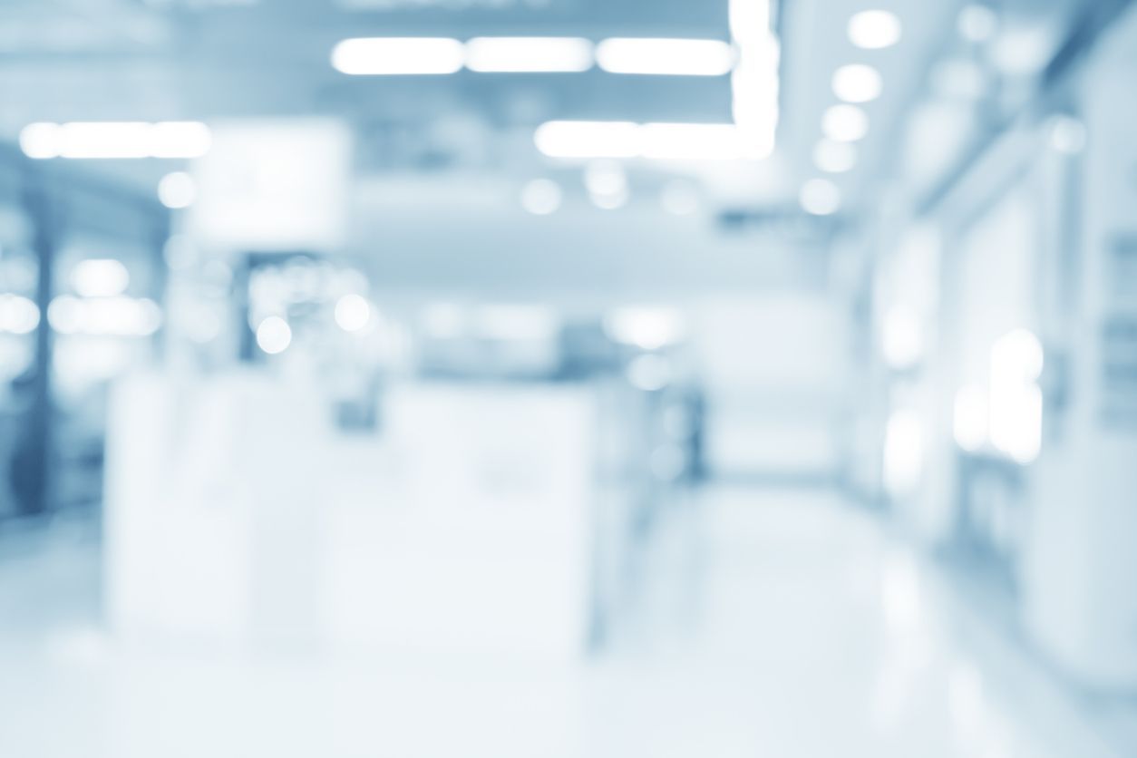 It is a blurry picture of a hospital hallway.
