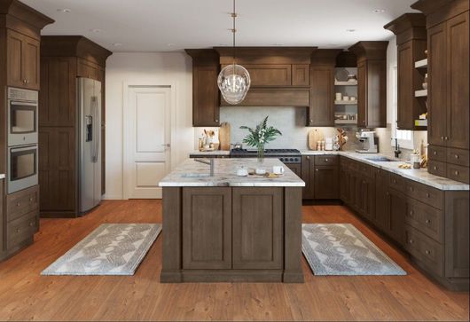 A kitchen with a large island in the middle of it