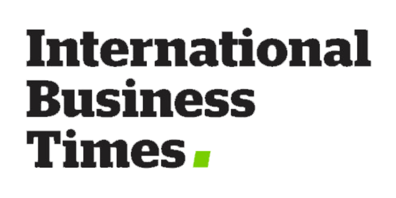 The logo for international business times is black and green on a white background.