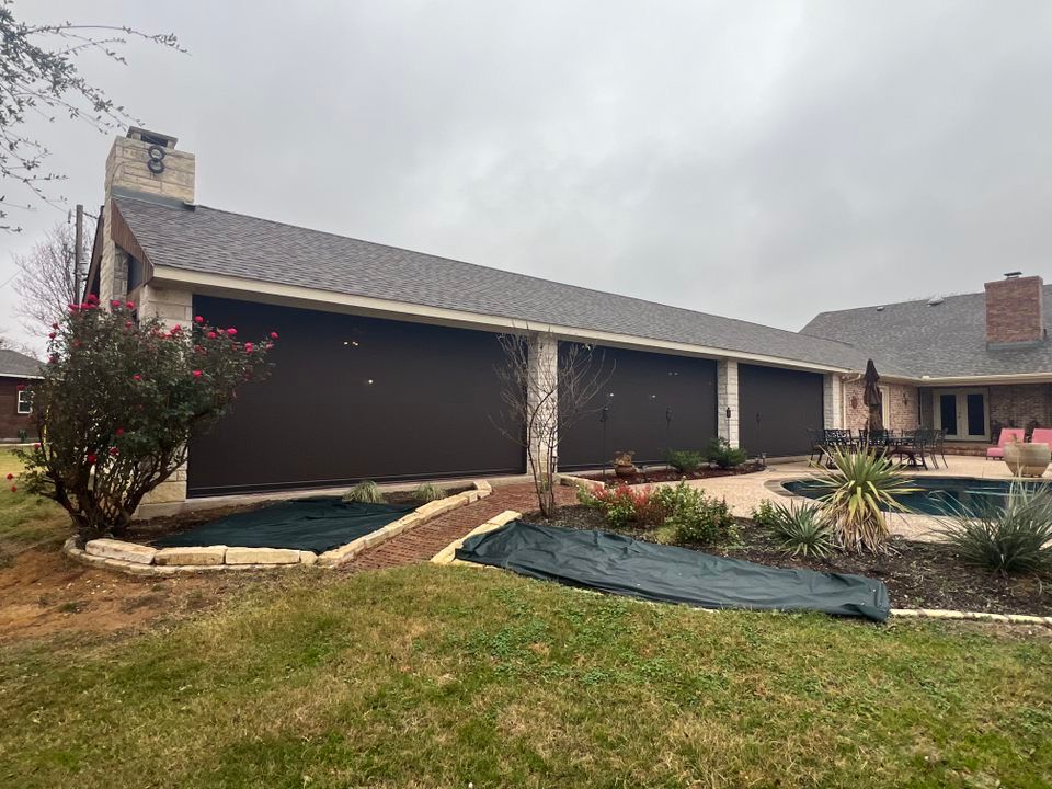 A large house with a swimming pool in the backyard.