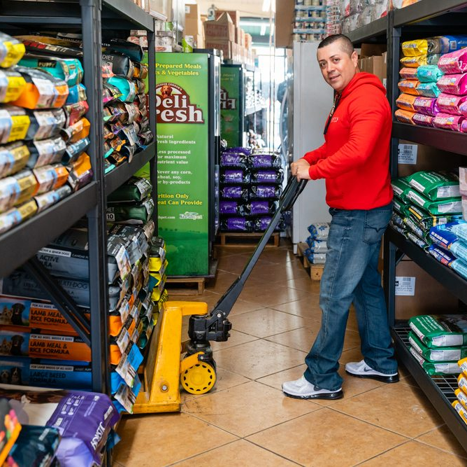 Smiling Men Looking at Top — Studio City, CA — Rusty’s Discount Pet Center