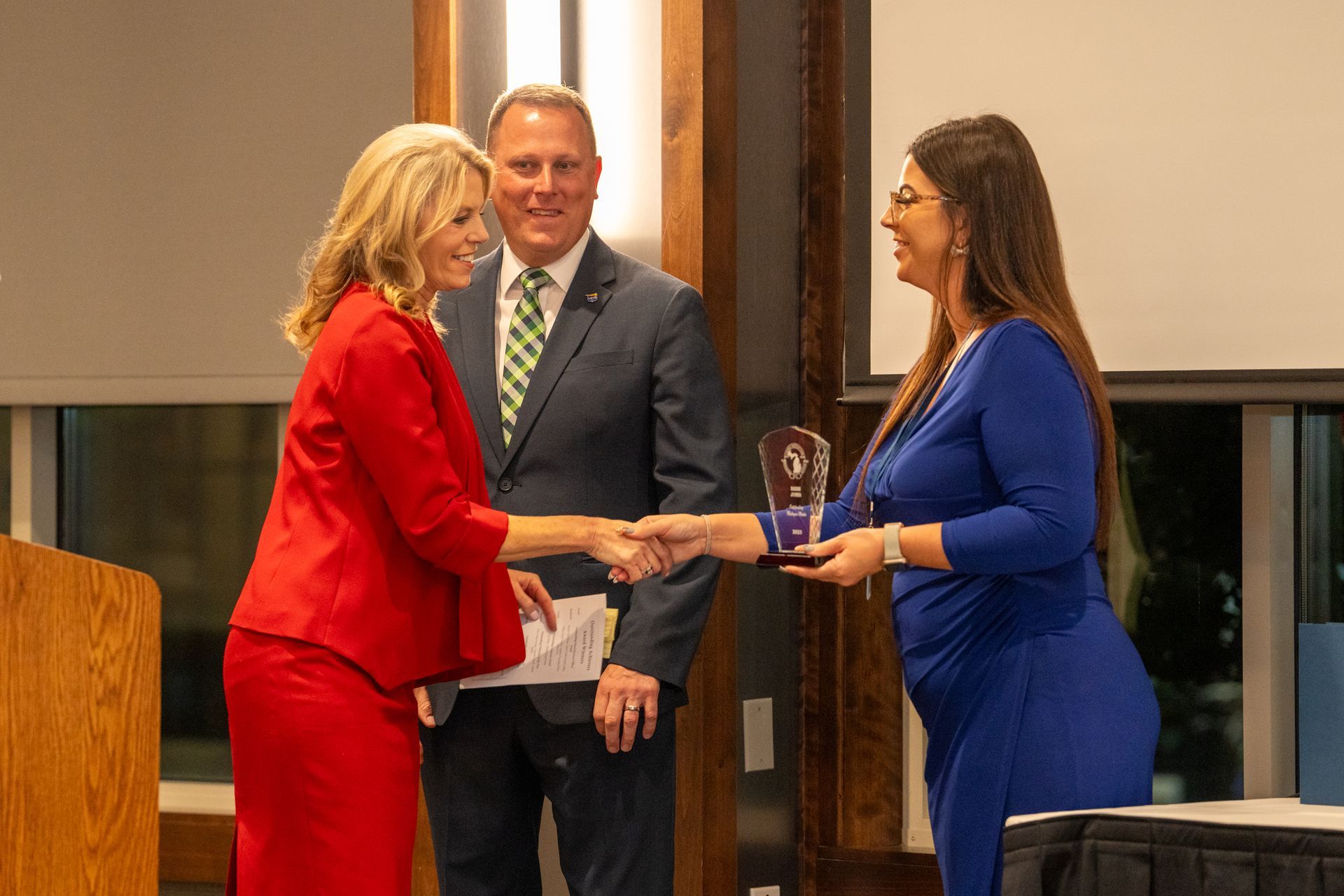 Shaking hands when presented a CPAM award