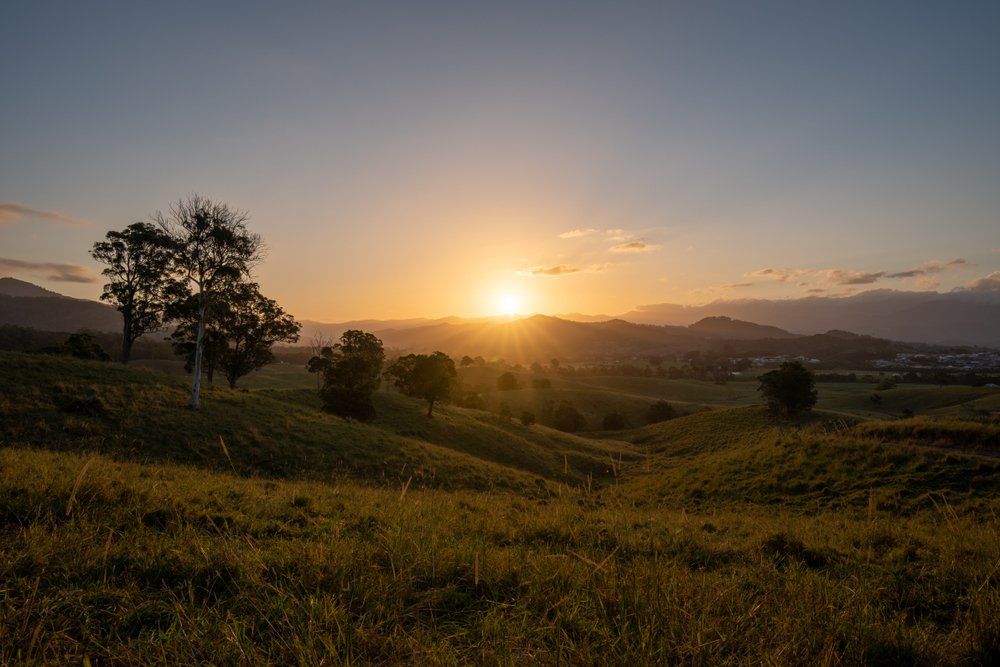 As The Sun Sets It Casts Beautiful Colours And Shadows Across The Farm Fields And Landscape Of Murwillumbah — Independent Scrap Metal in Ballina, NSW
