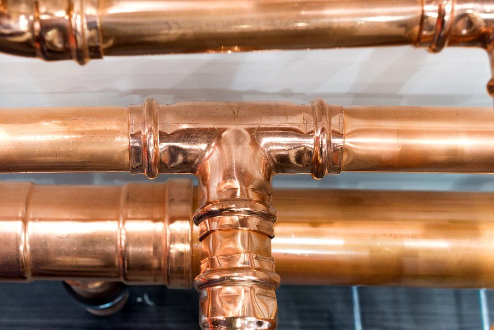 Brilliant New Copper Pipes. Connection Of Copper Pipes Blooming Fitting — Independent Scrap Metal in South Lismore, NSW