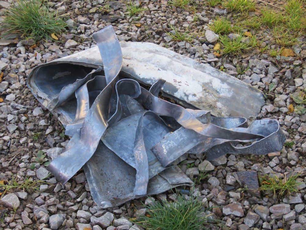 A Pile Of Lead Off Cuts, Scrap Lead — Independent Scrap Metal in South Lismore, NSW