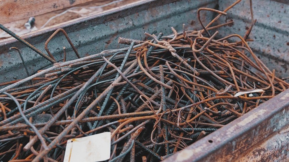 Metal Scraps from Construction Site Rebar Rods Stored in Waste Container — Independent Scrap Metal in South Lismore, NSW