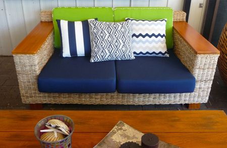 Outdoor couch with cushions — Outdoor Blinds  in Buderim, QLD