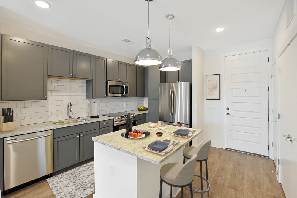 Modern Kitchen with Grey Cabinets and Large Island at The Brunswick