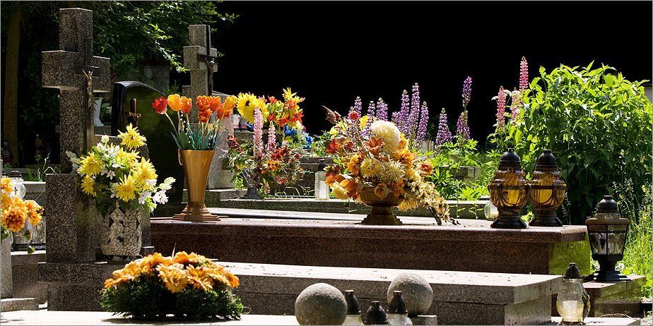 Headstones and floral tributes