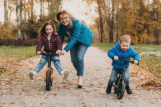 Mother Playing Bike With Kids — Sheridan, WY — Life Strategy Center