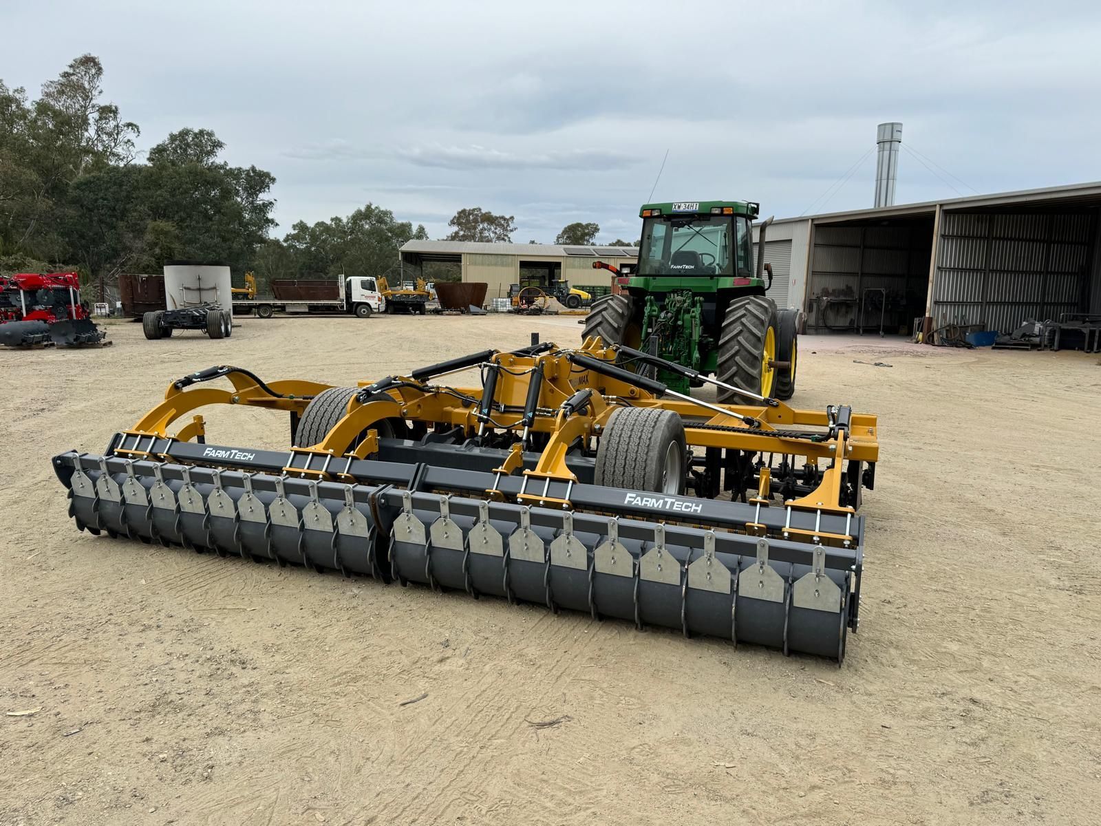 A close up of a machine with a lot of blades on it in a field.