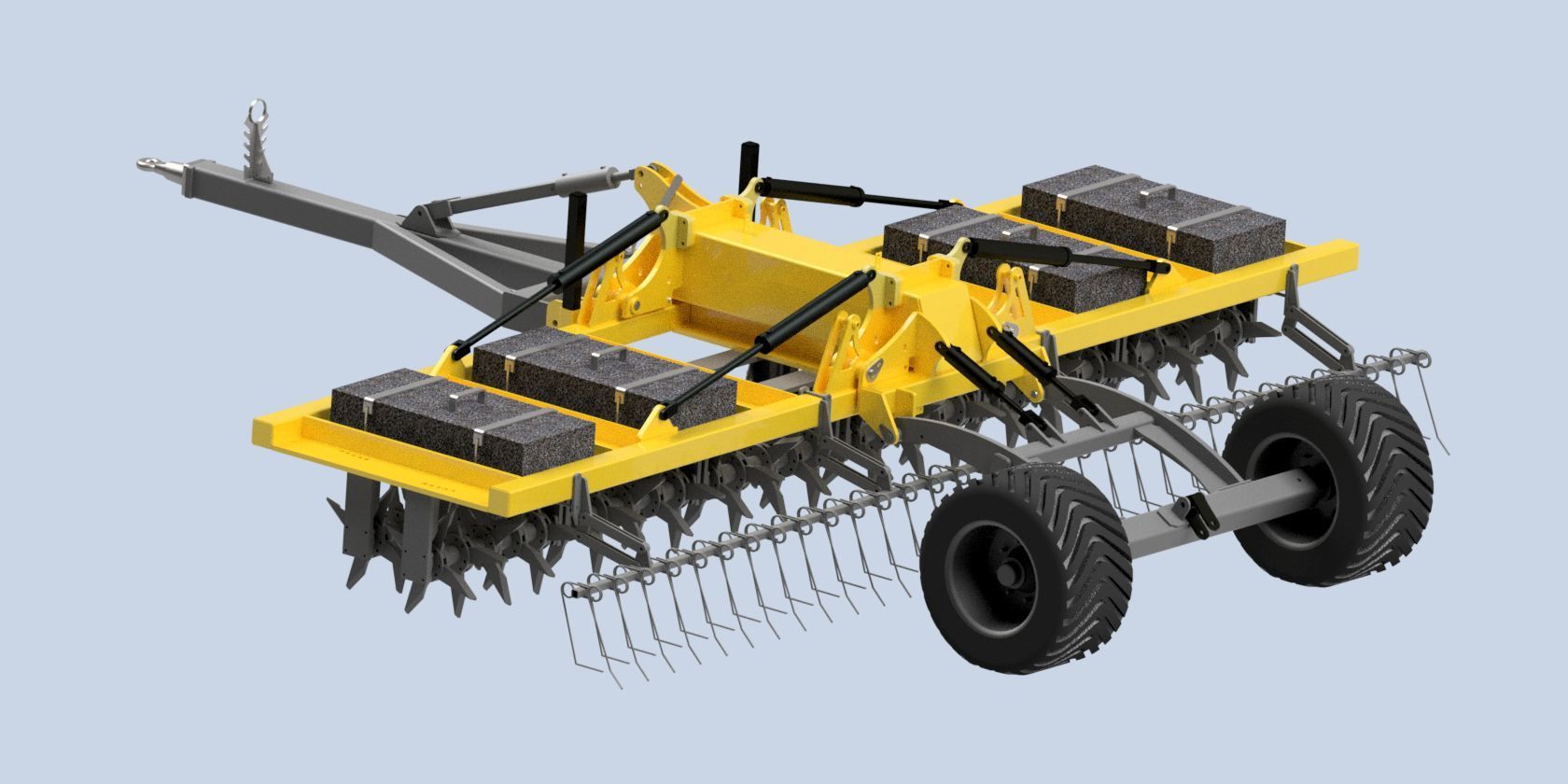 A tractor is parked in a grassy field with a Aervator attached to it.