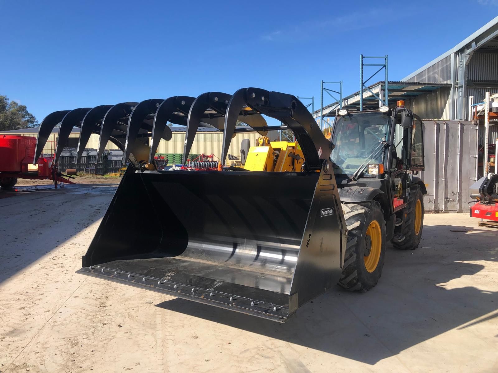 A yellow and black machine with the word bk on it