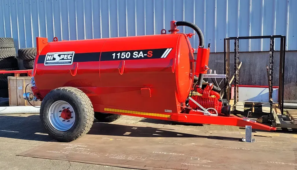 A red trailer with the number 1150 on it