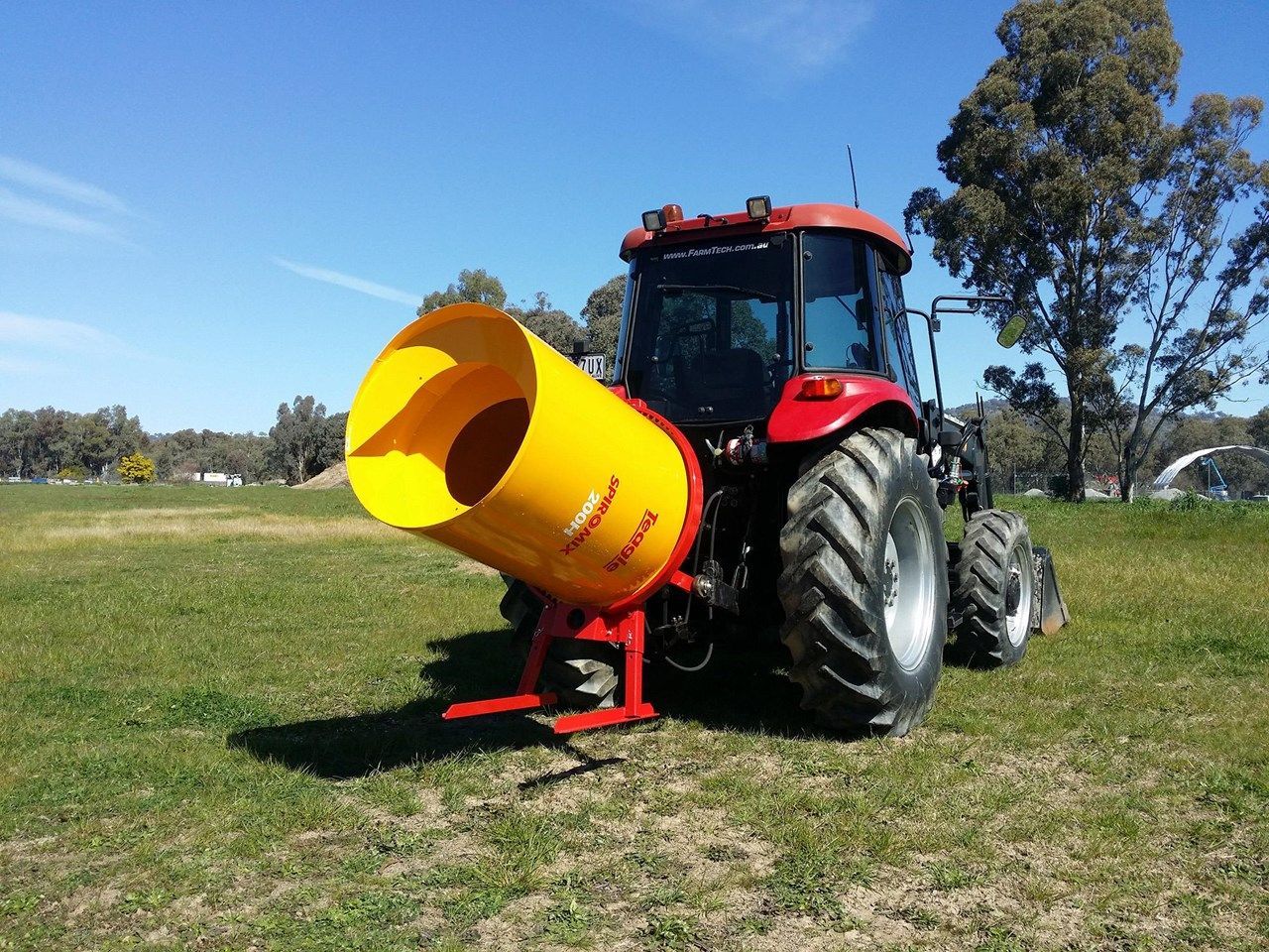 A yellow and black machine with the word bk on it