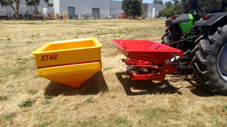 A yellow container with the word xt48 on it