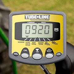 A yellow and gray device that says tube line on it