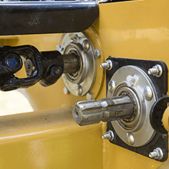 A close up of a PTO shaft on a machine