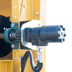 A close up of a machine with a hose attached to it