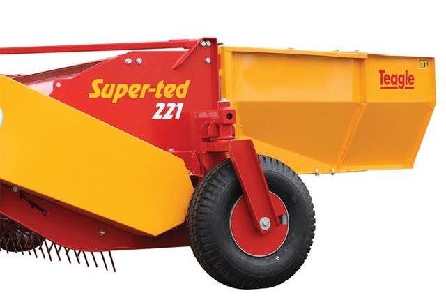 A red and yellow tractor with the words super-ted 221 on it