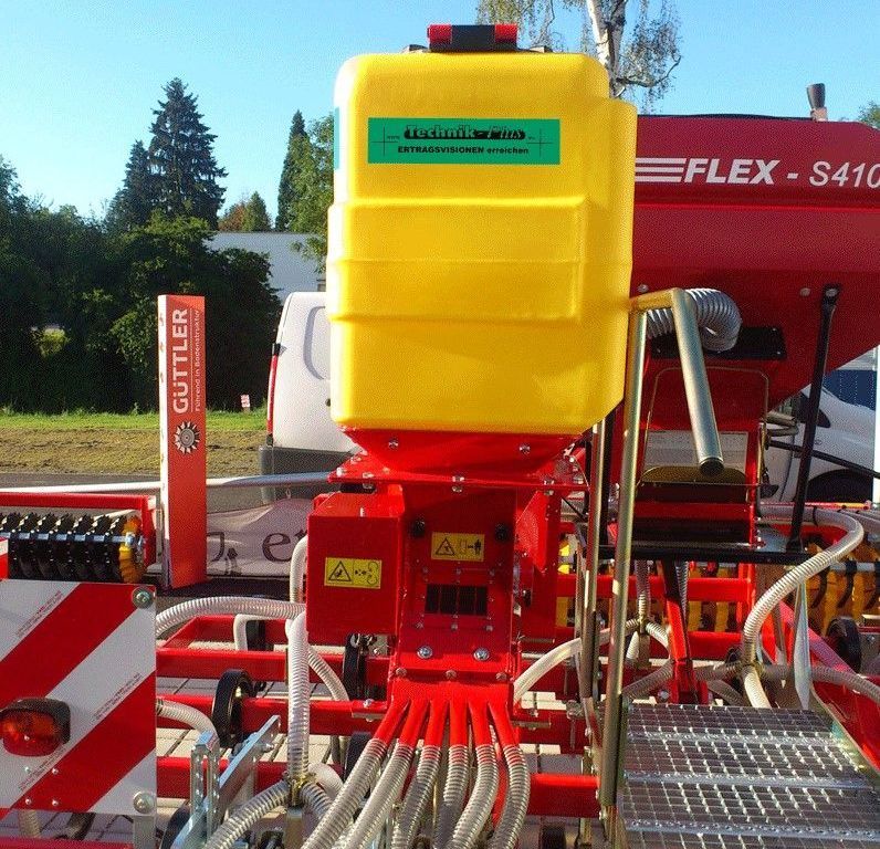 A yellow container with the word guttler on it