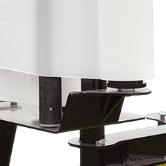 A machine with a white box on top of it