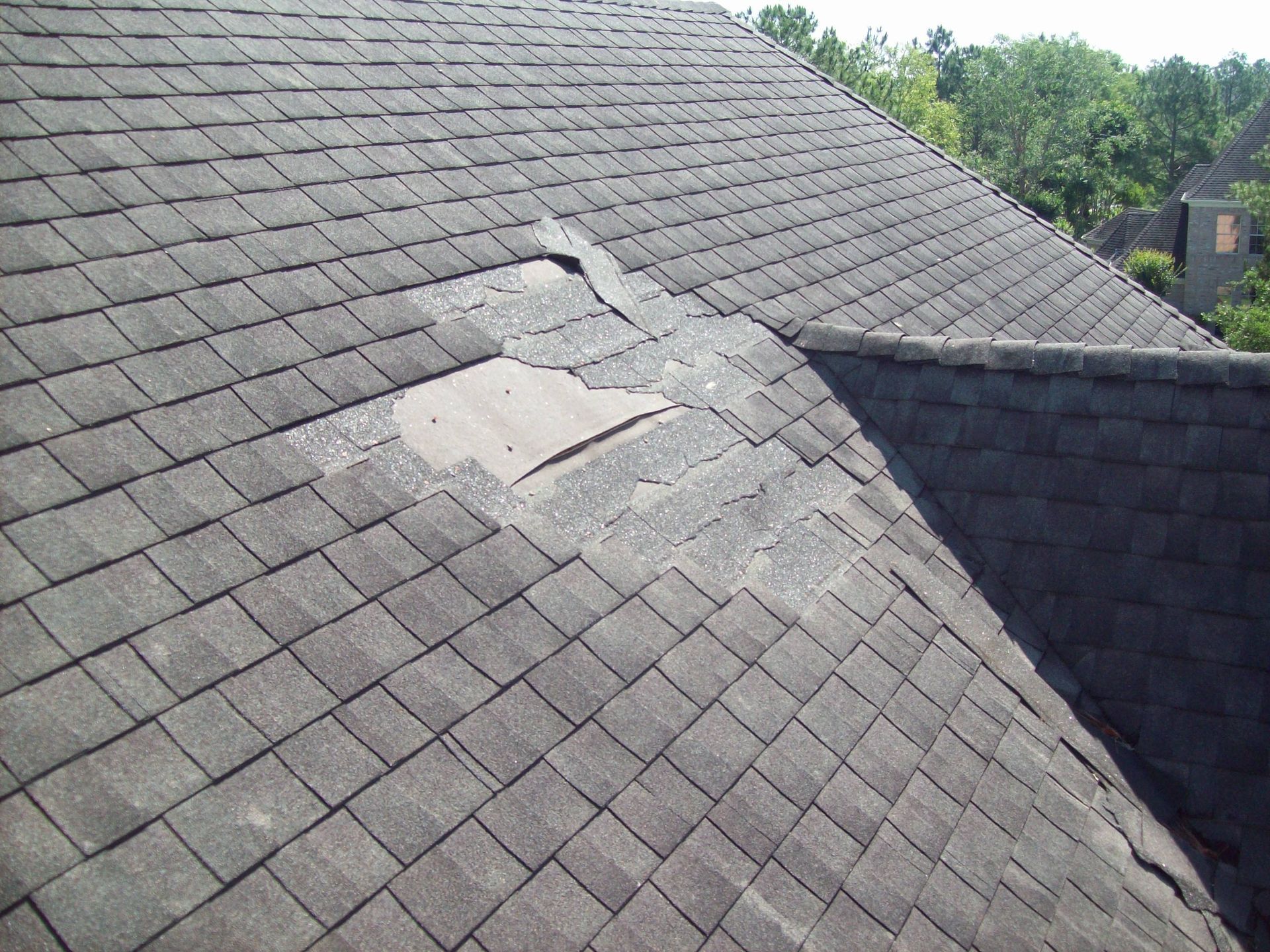 Aging sagging roof with chimney